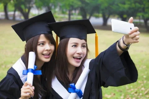depositphotos_65843957-stock-photo-two-happy-women-in-graduation